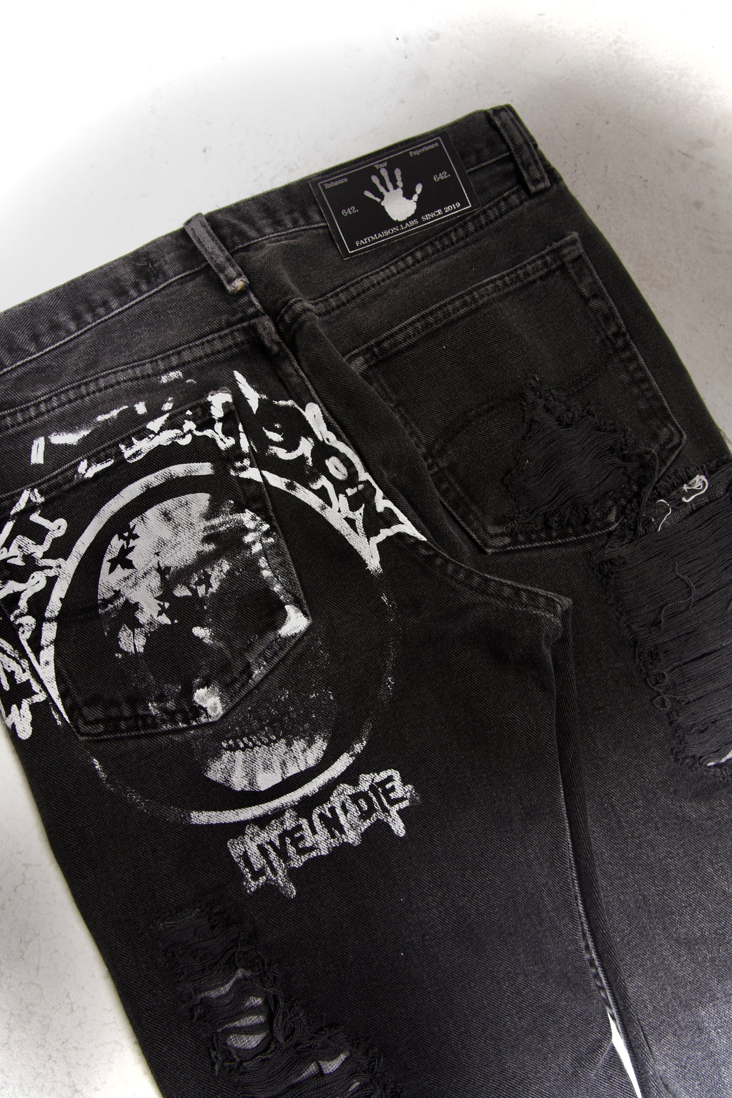 Full Distressed and repaired black denim/ Og Skull logo